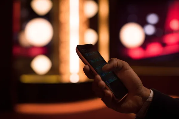 A glowing roulette wheel with cascading chips, symbolizing the engaging live and instant-win games available on TKPK.